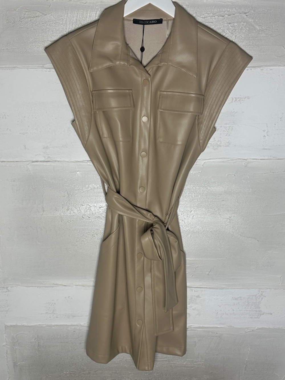 New w tags. Dolce Cabo tan belted dress. Faux leather